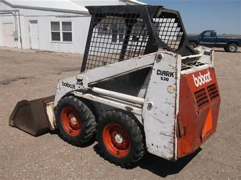 clark 530 skid steer|bobcat 530 lifting capacity.